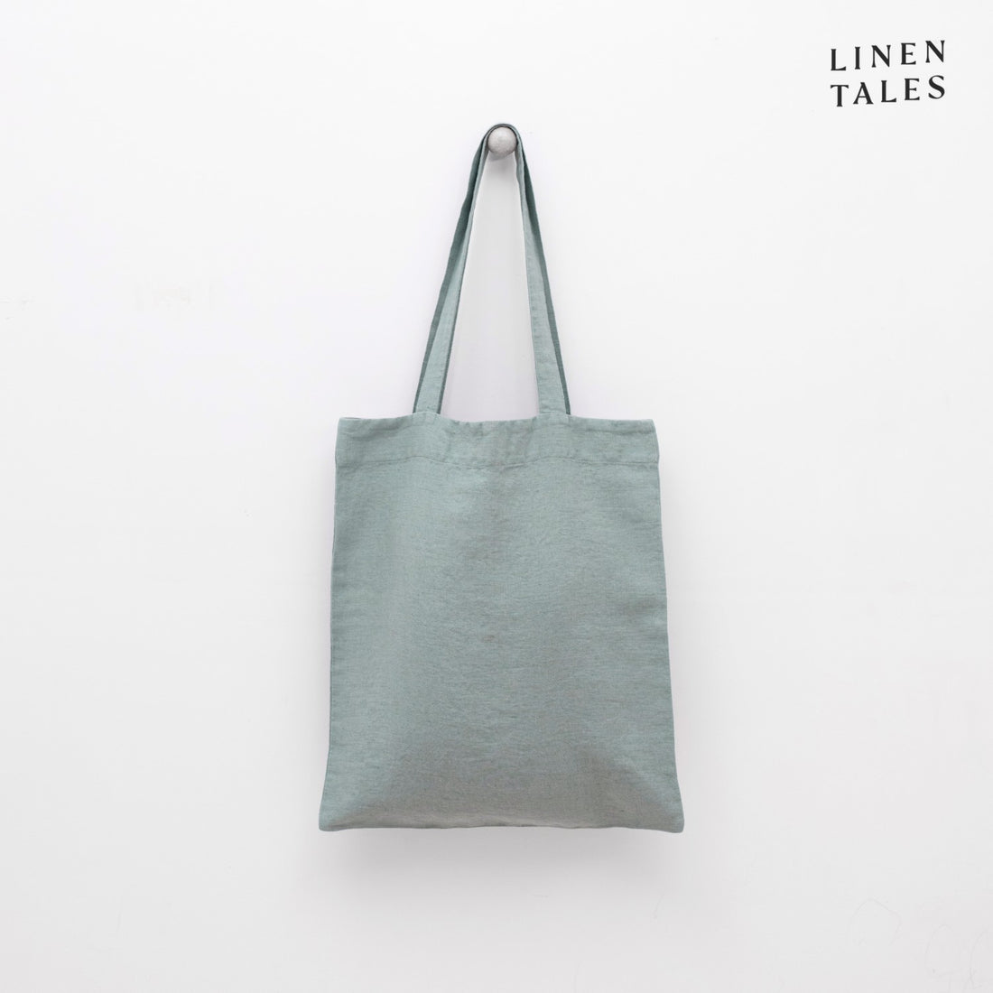 Leinen-Tasche 'Green Milieu' von Linen Tales – handgefertigt in Litauen aus 100 % natürlichem, OEKO-TEX®-zertifiziertem Leinen. Maße: 42 × 38 cm. Ideal für Einkäufe, Strandbesuche oder den Alltag